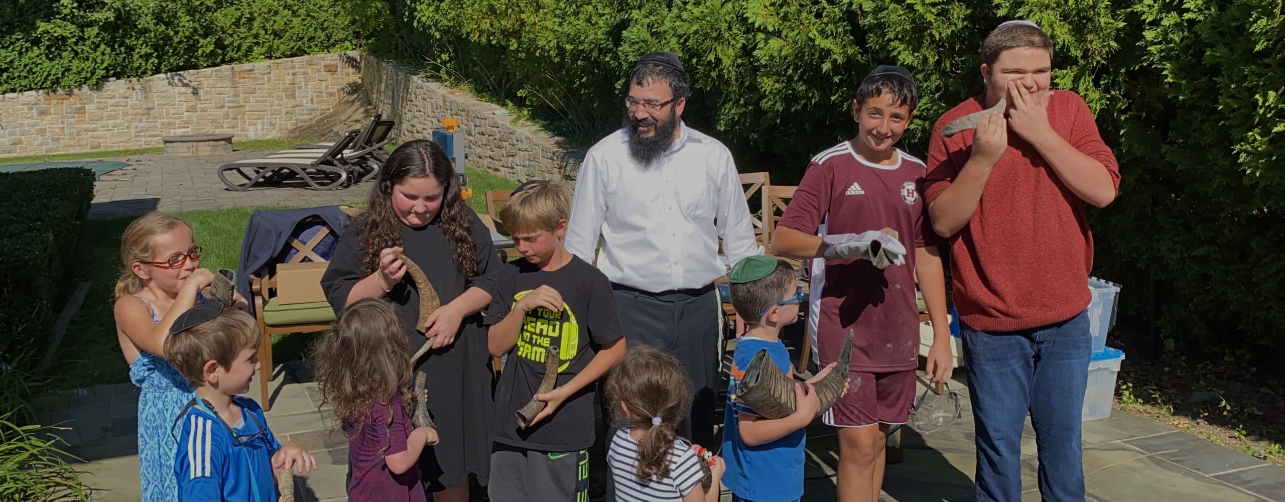 YIOH kids making shofars for Rosh Hashanah